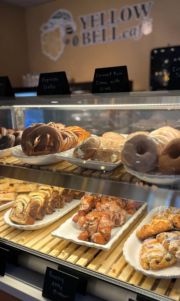 yellow bell baked goods in display